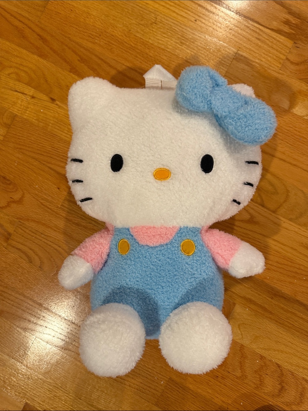 Hello Kitty Plush Adjustable Backpack- White, Blue Bow and Pink Outfit Accents
